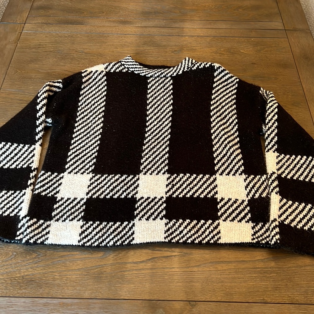 Never worn black and white checkered sweater
